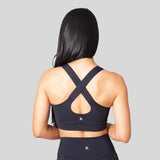 Top deportivo para mujer con cruce en la espalda 7K Sport Wear