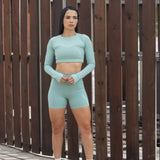 Crop top deportivo manga larga con agujero para el dedo