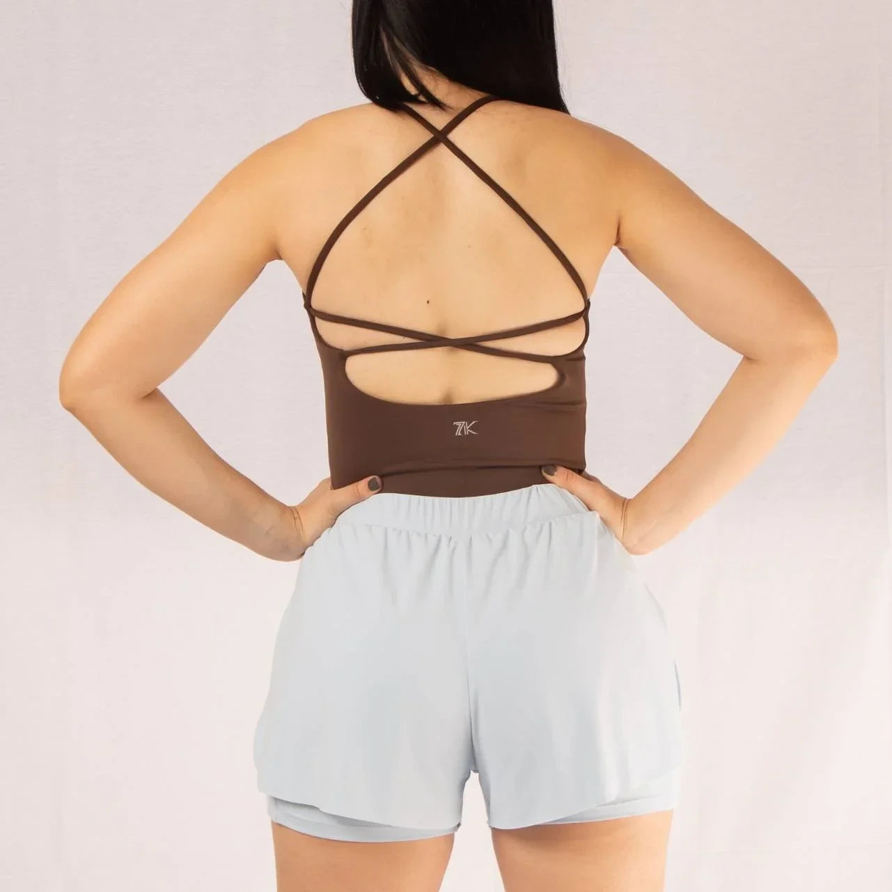 Pantaloneta con bolsillo running 7K Sport Wear