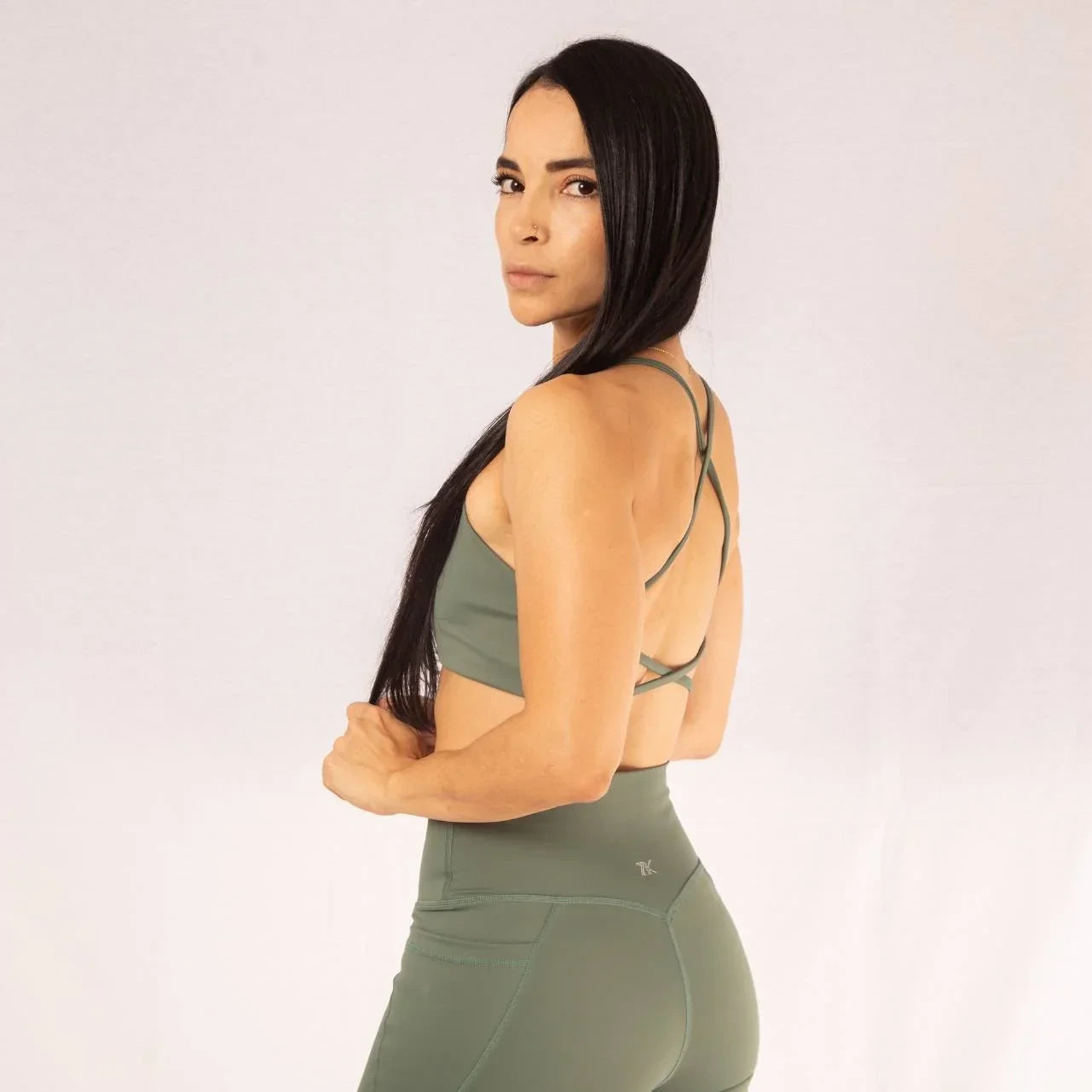 Top deportivo para mujer con tiras espalda cruzada 7K Sport Wear